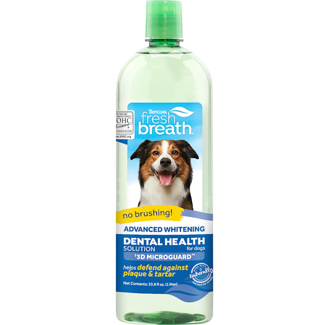 TropiClean Fresh Breath Advanced Whitening Dental Health Solution for Dogs, 33.8 fl. oz. - Carousel image #1