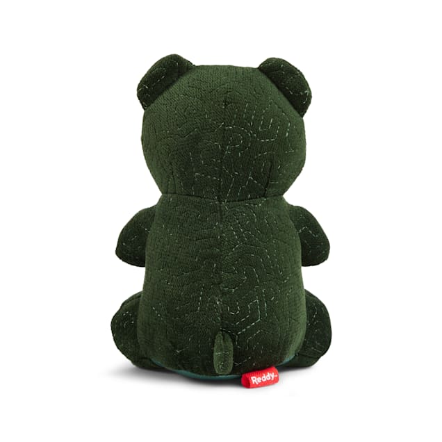 Green stuffed store dog