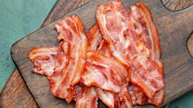 Can Dogs Eat Bacon? Risks, Safety & Better Treats
