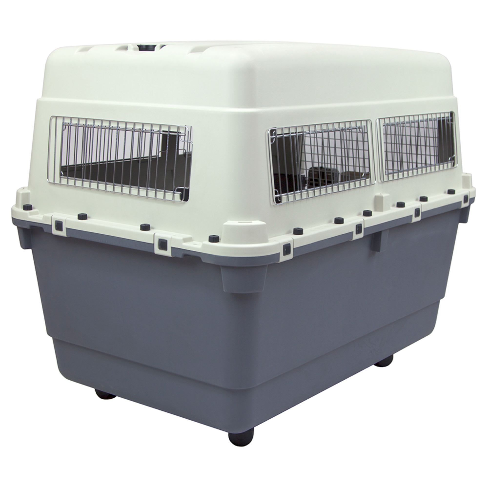 Plastic dog crate with side outlet door