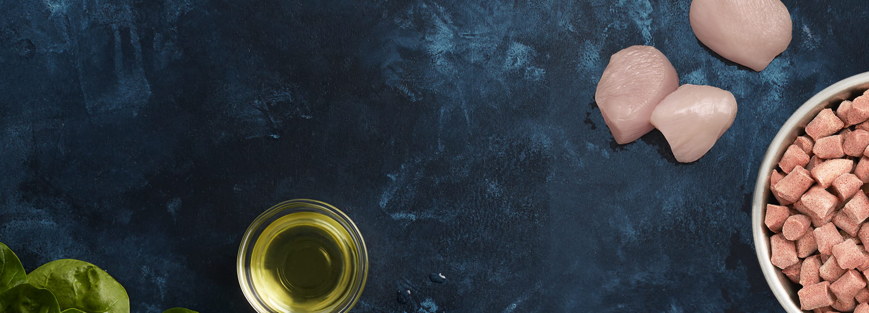 Snowflake icon and images of frozen, raw pet food and associated ingredients