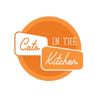 Cats In The Kitchen.