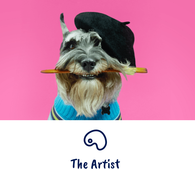 Dog holding paintbrush in mouth