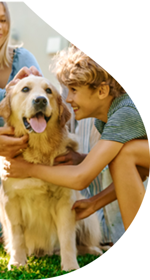 A family with their Golden Retriever.