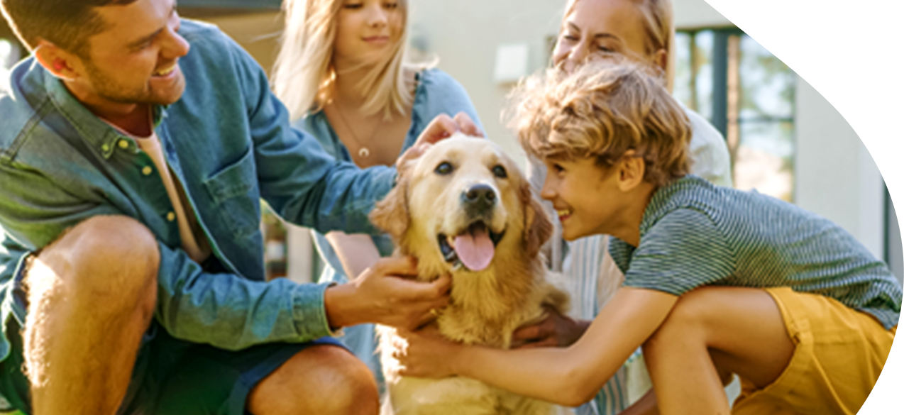 A family with their Golden Retriever.